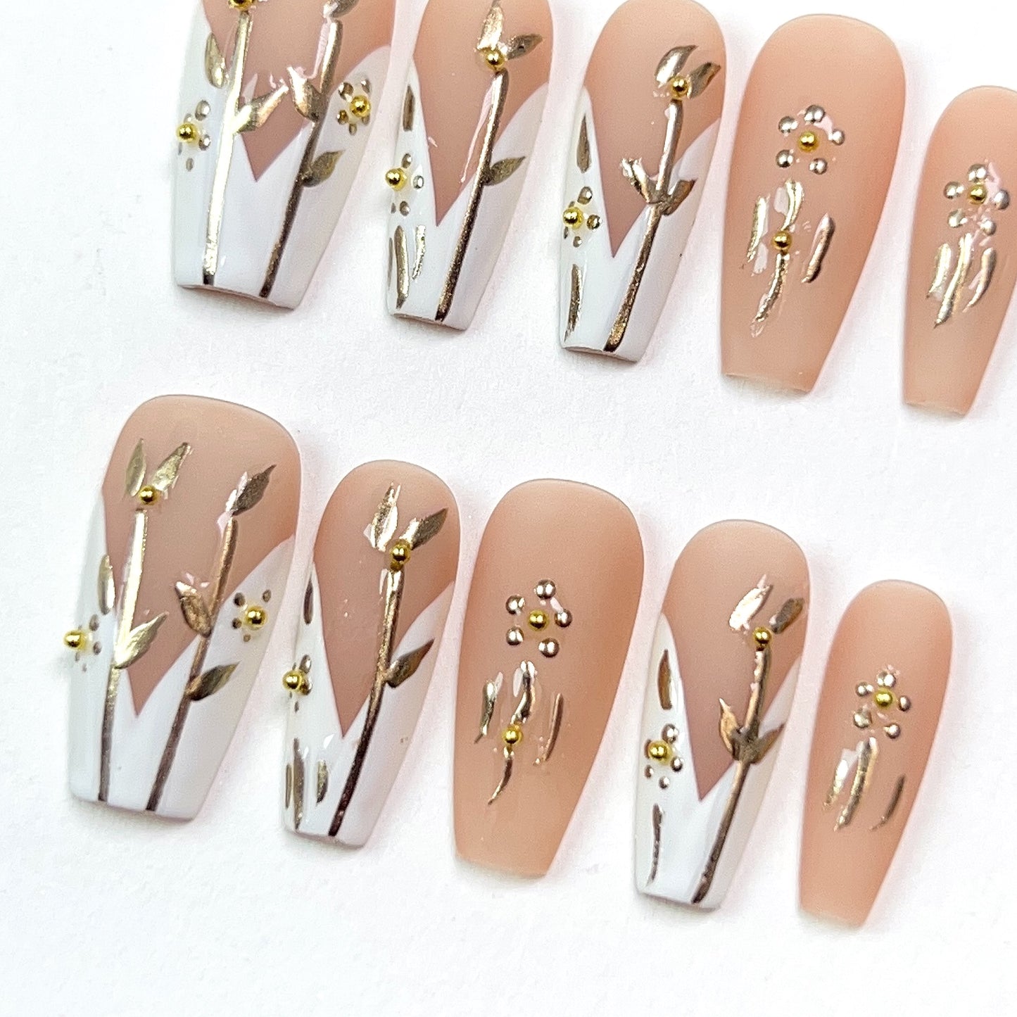 Nude Powder Mid Length Embossed Gold Flower Press-on Nails