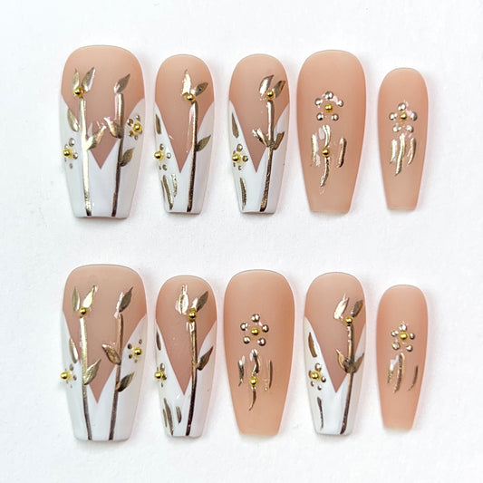 Nude Powder Mid Length Embossed Gold Flower Press-on Nails